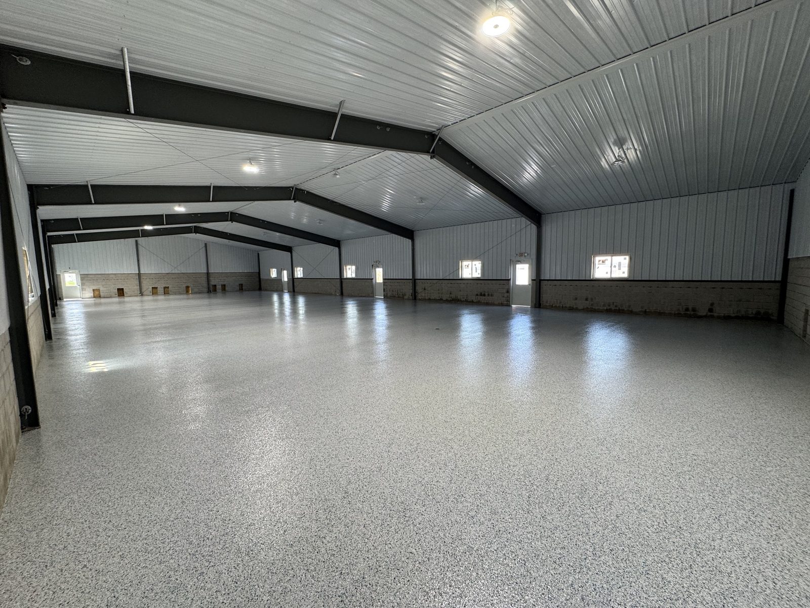 Steel building interior with a glossy coated floor