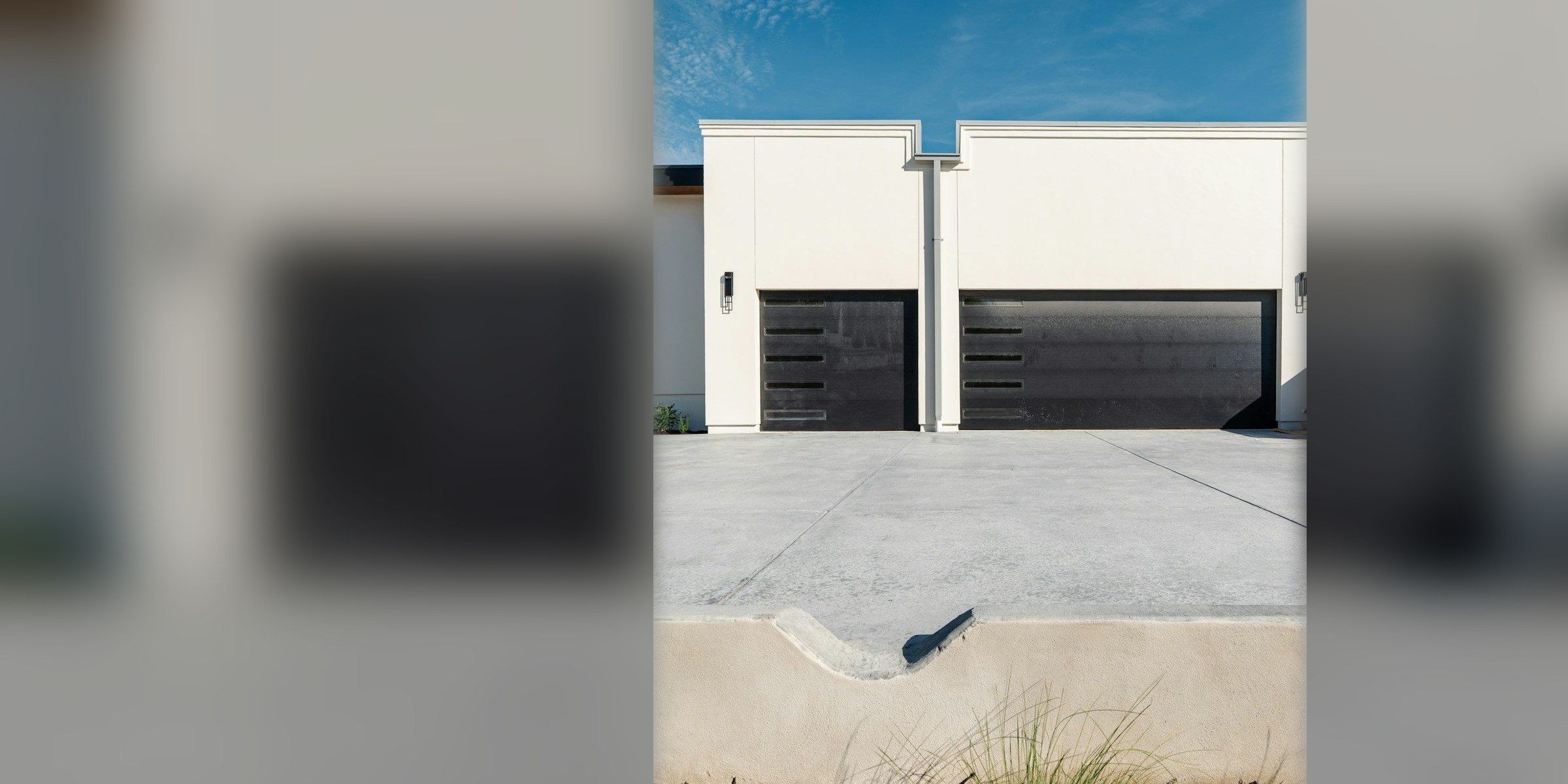 Modern home with a coated driveway