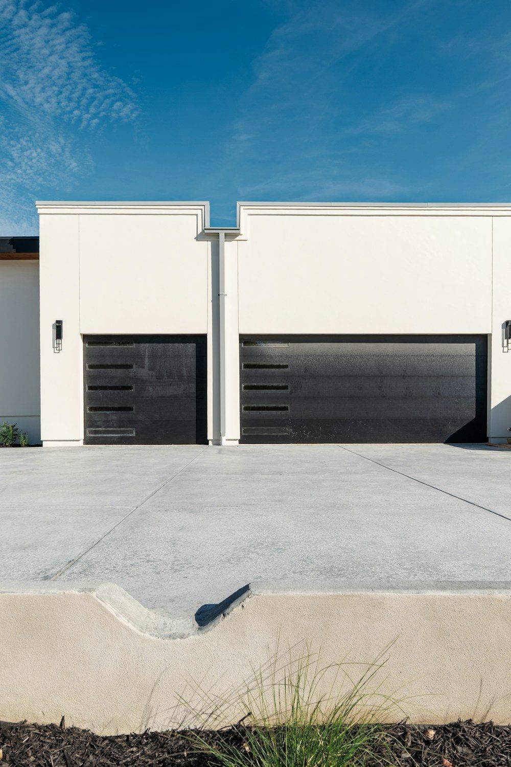 Modern home with a coated driveway