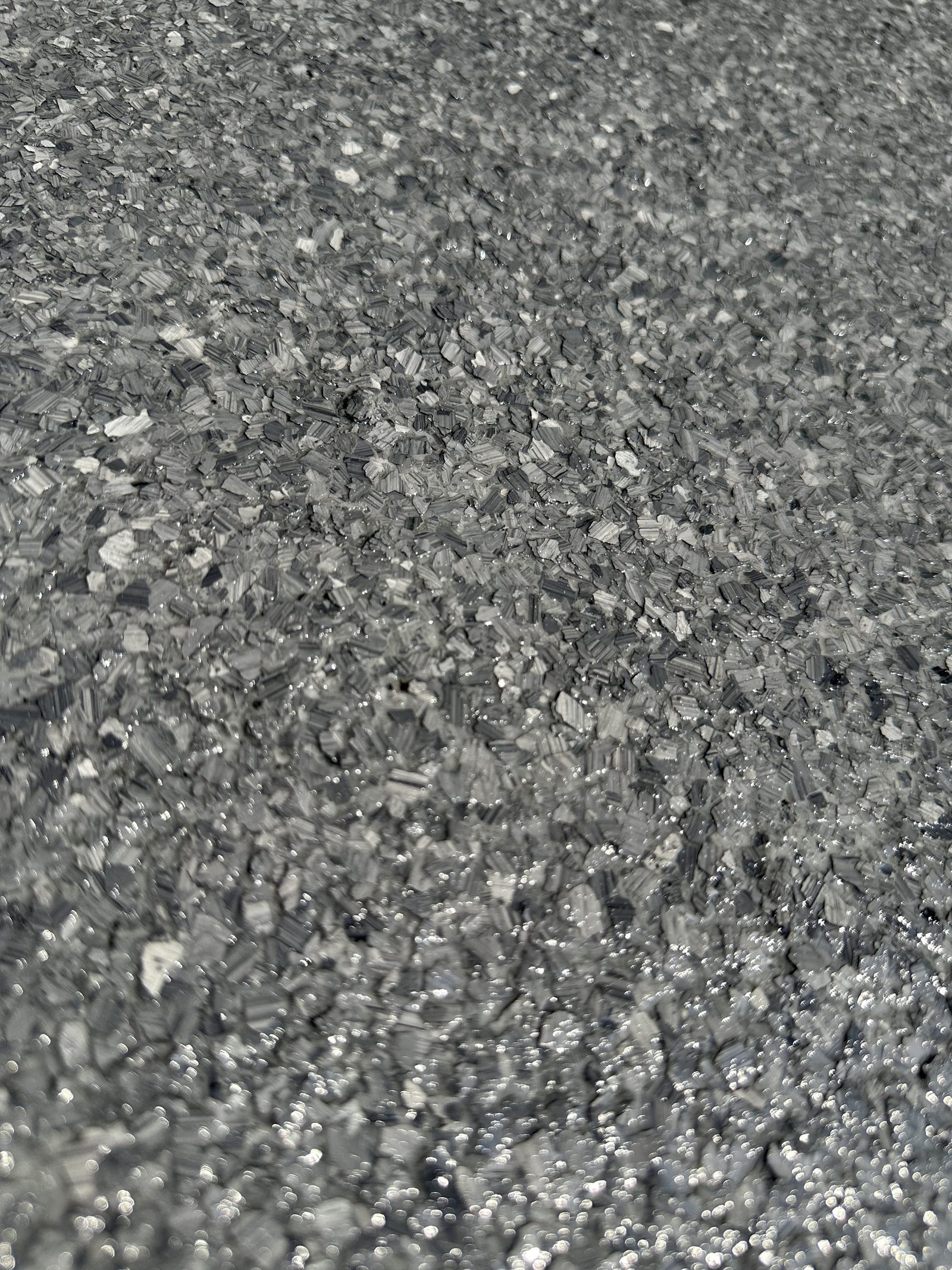 Close-up of gray flake floor