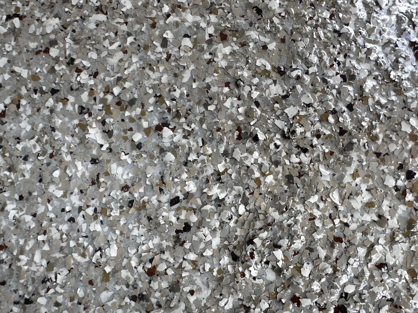 Creekbed flake on an installed garage floor