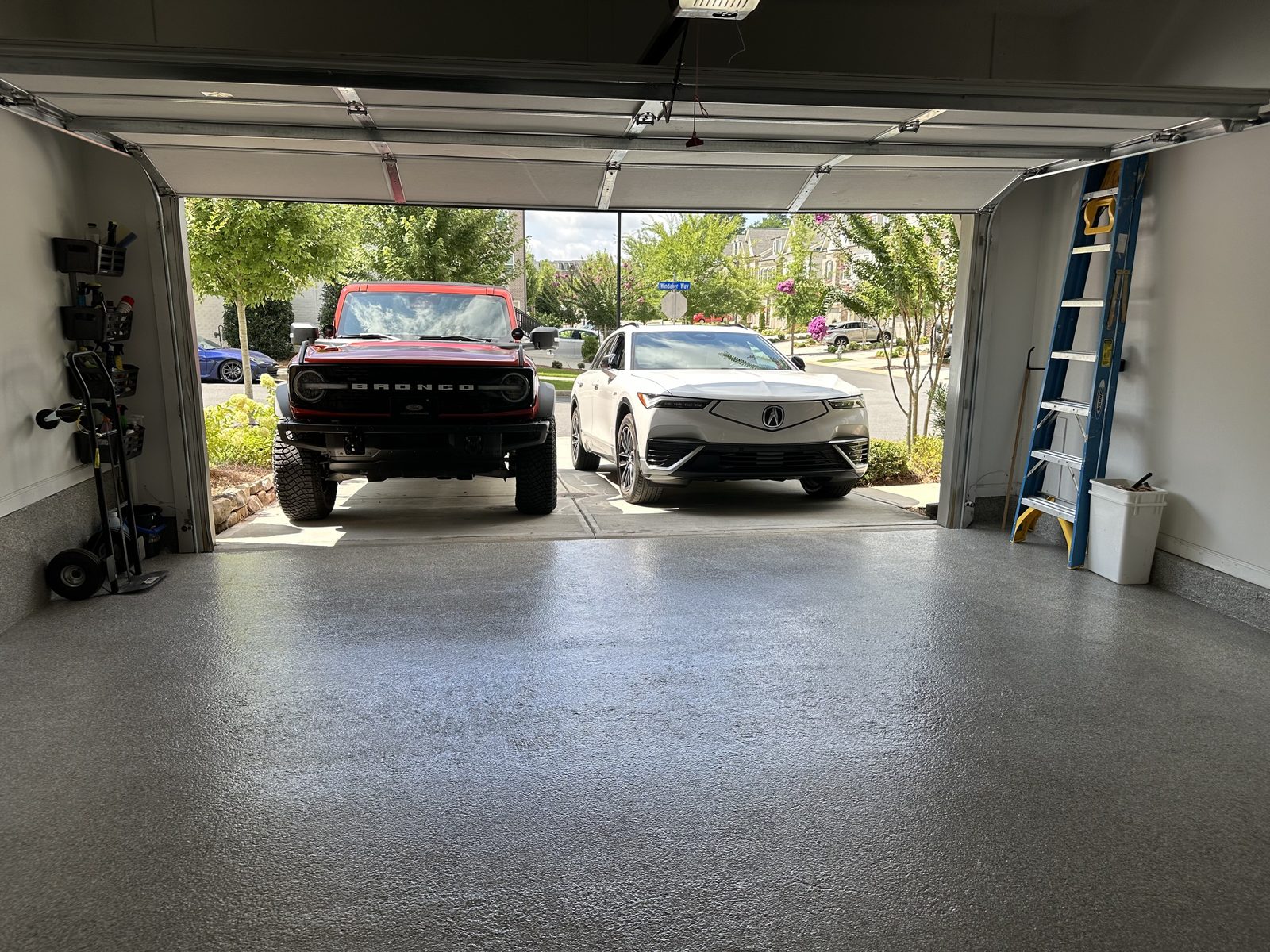 Cars parked on a coated garage floor
