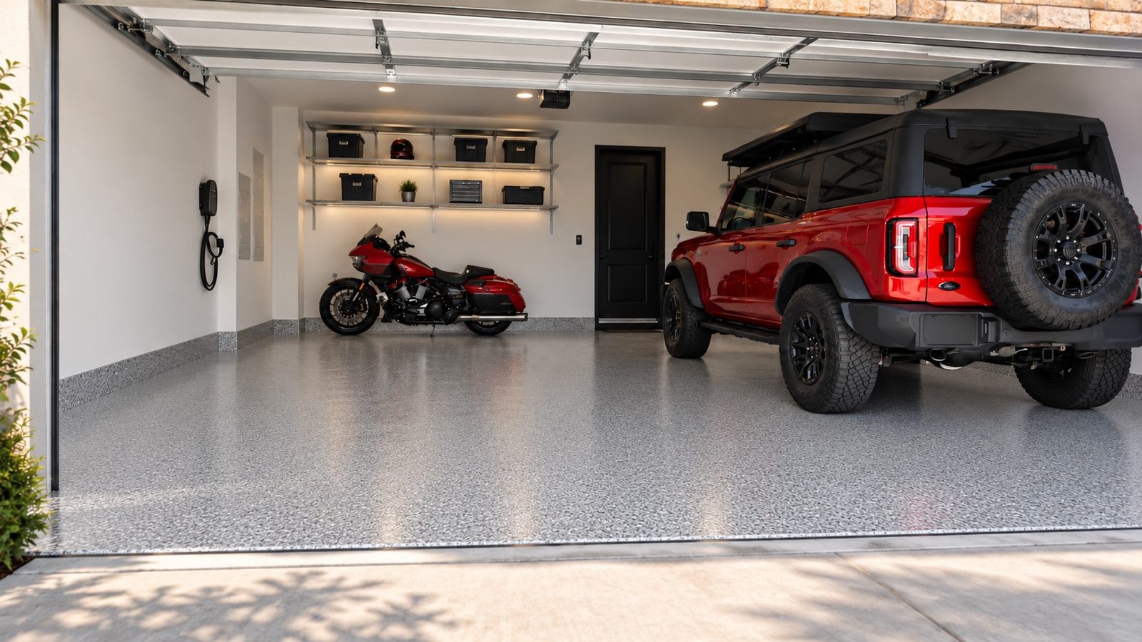 Finished garage floor with a truck parked on gray flake