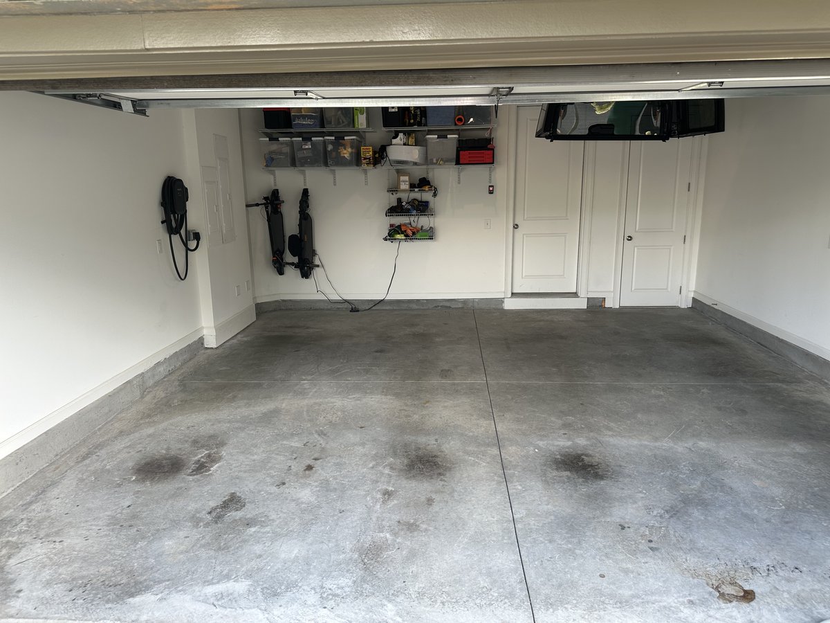 Garage floor before coating - stained concrete with oil spots